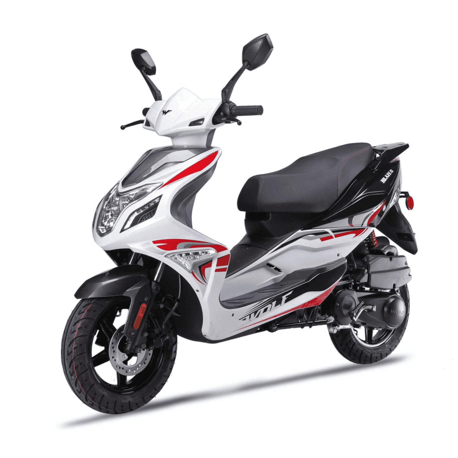 A white scooter with red accents parked on top of the road.