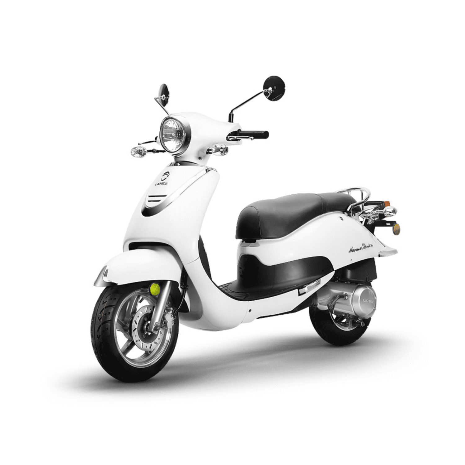 A white scooter is parked on the ground.