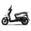 A white scooter is parked on the ground.