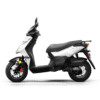 A white scooter is parked on the ground.