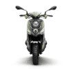 A green scooter with its front lights on.