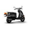 A black scooter with orange accents is parked.