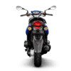 A blue motorcycle is shown with its lights on.