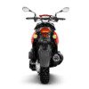 A red and black motorcycle is shown from the front.
