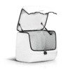 A white bag with an open lid on it.