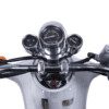 A close up of the handlebars and gauges on a motorcycle.