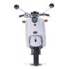 A white scooter with two front wheels and a black tire.