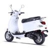 A white scooter is parked on the ground.