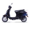 A scooter is parked on the side of the road.