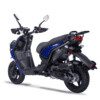 A blue and black scooter is parked on the ground.
