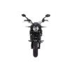 A black motorcycle with its front lights on.