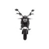 A motorcycle is shown with the front lights on.