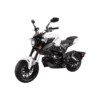 A white motorcycle is parked on the ground.