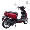 A red scooter is parked on the street.