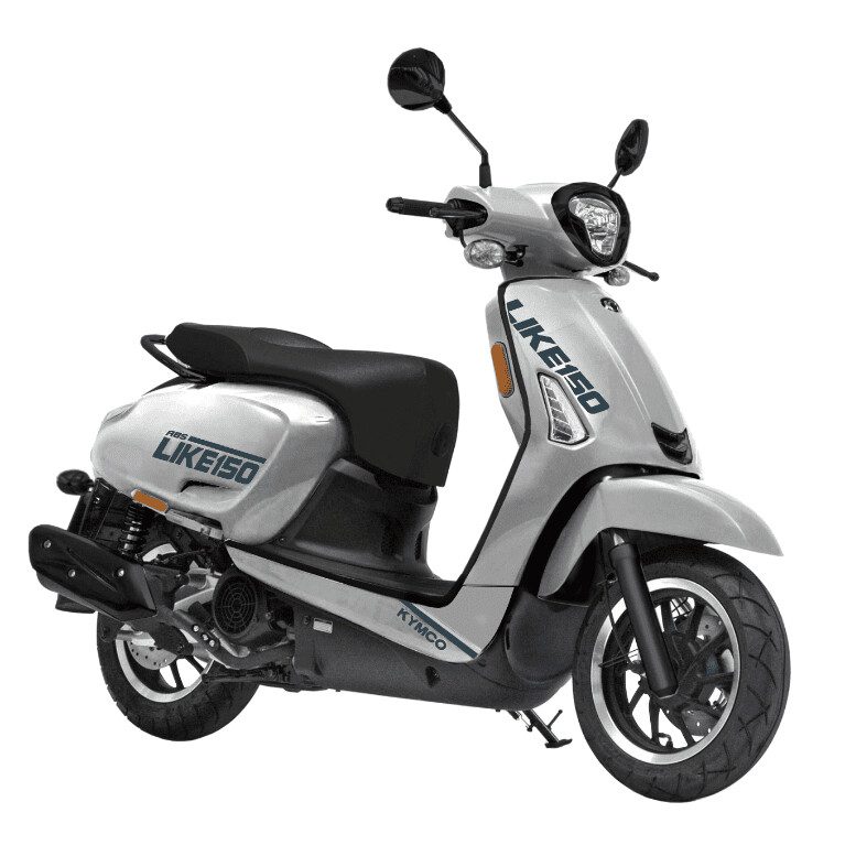A white scooter is parked on the street.