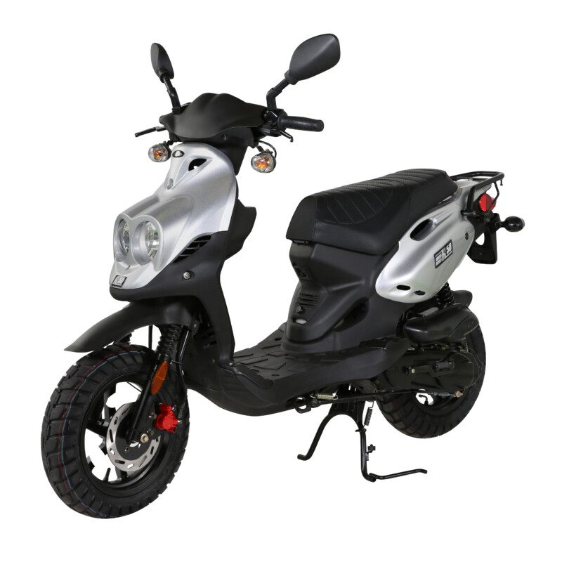 A scooter is parked on the ground.