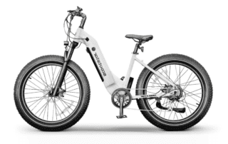 A white electric bike is parked on the ground.