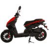 A red and black scooter is parked on the ground.