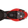 A red motorcycle with the seat up and its front part open.