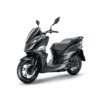 A black and silver motorcycle is parked on the ground