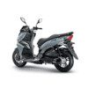 A silver scooter is parked on the ground.