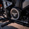 A close up of the front wheel on a motorcycle.