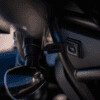 A close up of the side mirror on a motorcycle.