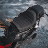 A motorcycle seat is shown on the back of it.